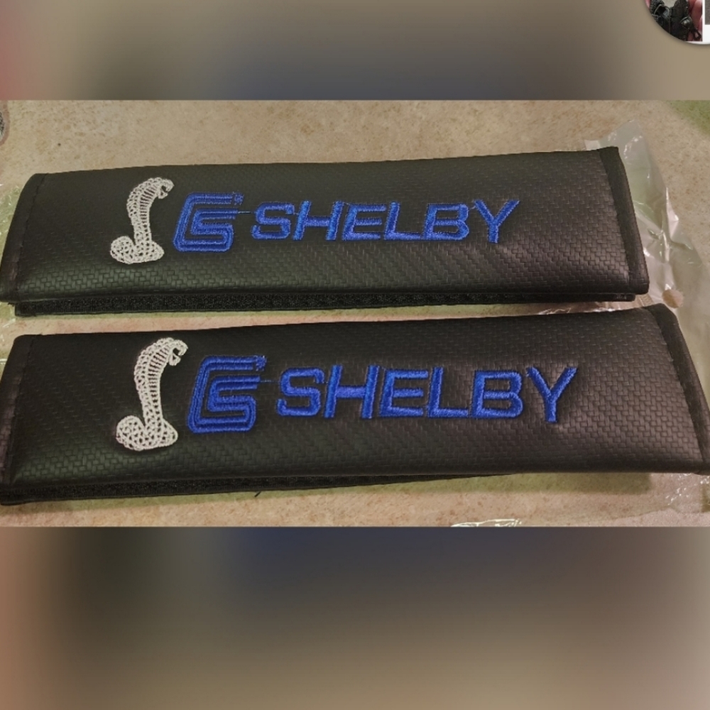 2 Shelby Mustang snake cobra car seat belt pads covers.